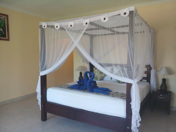 Imagen de la habitación del Hotel Bintang Beach Villas, Bunutan. Foto 25