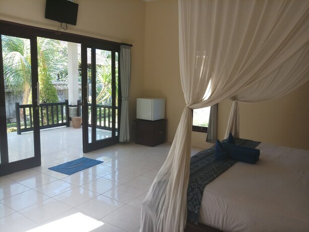 Imagen de la habitación del Hotel Bintang Beach Villas, Bunutan. Foto 32