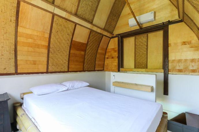 Imagen de la habitación del Hotel Bintang Bungalow. Foto 3
