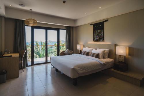 Imagen de la habitación del Hotel Bintang Flores. Foto 3