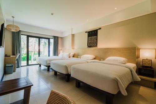 Imagen de la habitación del Hotel Bintang Flores. Foto 4