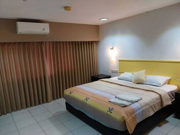 Imagen de la habitación del Hotel Bintang, Klandasan Ulu. Foto 19