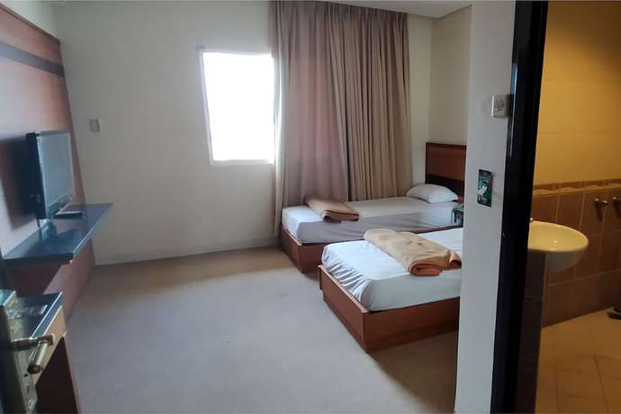 Imagen de la habitación del Hotel Bintang Solo. Foto 8