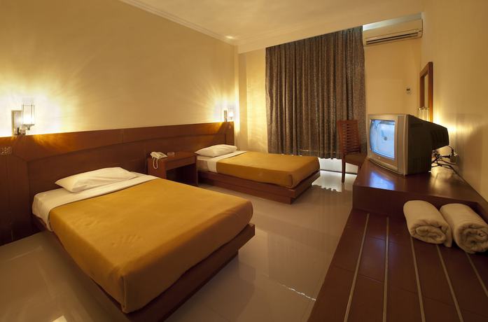 Imagen de la habitación del Hotel Bintang Solo. Foto 9