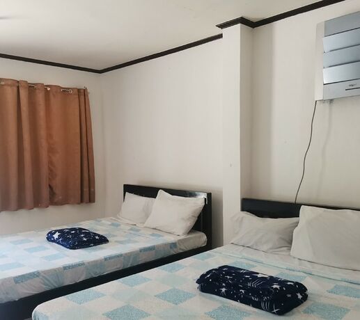 Imagen de la habitación del Hotel Binubusan Beach and Resort. Foto 19