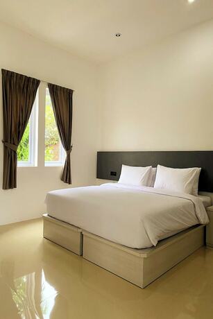 Imagen de la habitación del Hotel Binumar Guest House. Foto 15