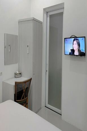 Imagen de la habitación del Hotel Binumar Guest House. Foto 16