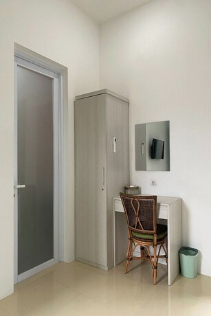 Imagen de la habitación del Hotel Binumar Guest House. Foto 19