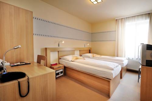 Imagen de la habitación del Hotel Biograf. Foto 16
