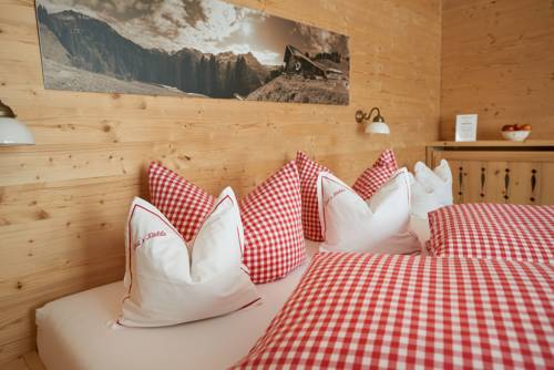 Imagen de la habitación del Hotel Biohotel Walser Stuba. Foto 7