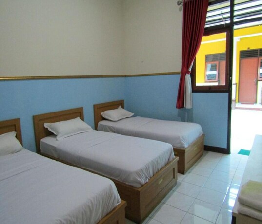 Imagen de la habitación del Hotel Bip Tawangmangu. Foto 19