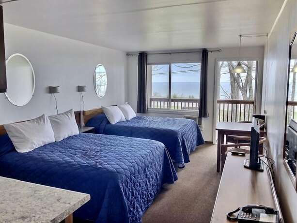 Imagen de la habitación del Hotel Birchmont Motel. Foto 17
