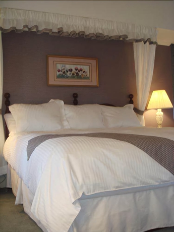 Imagen de la habitación del Hotel Bird In Hand Village Inn And Suites. Foto 15