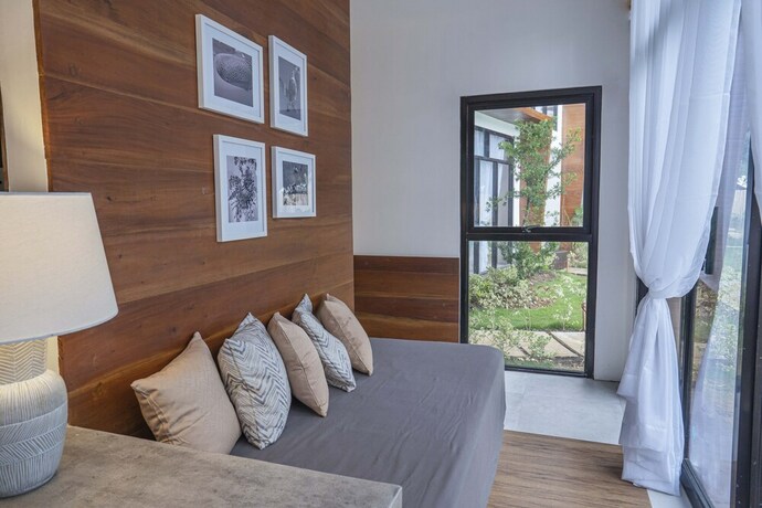 Imagen de la habitación del Hotel Bird Of Paradise Bohol Resort. Foto 17