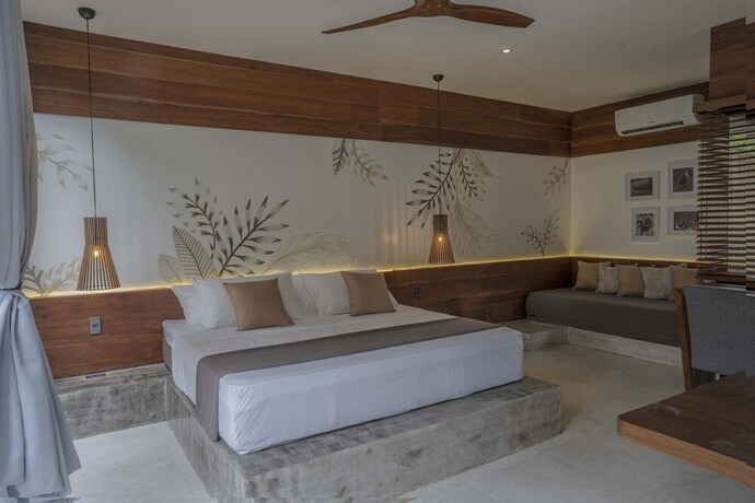 Imagen de la habitación del Hotel Bird Of Paradise Bohol Resort. Foto 23