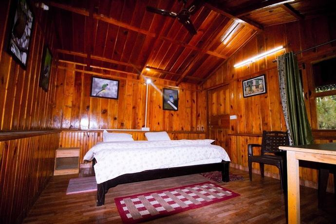 Imagen de la habitación del Hotel Birders Den Eco Resort. Foto 14