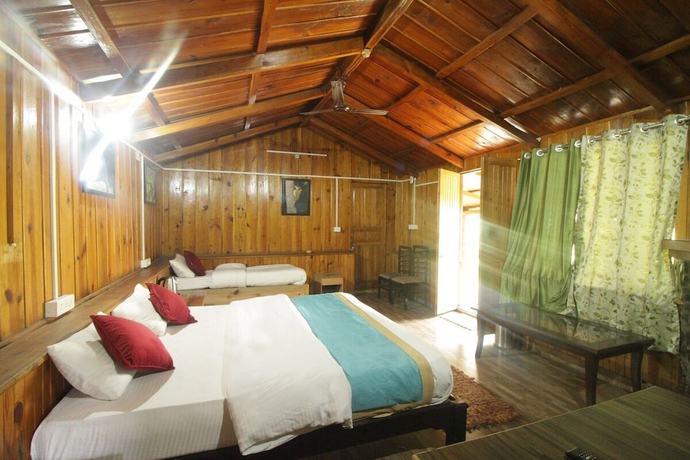 Imagen de la habitación del Hotel Birders Den Eco Resort. Foto 17