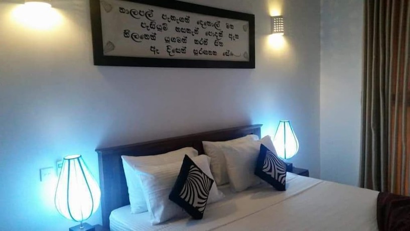 Imagen de la habitación del Hotel Birdwing Sigiriya. Foto 7