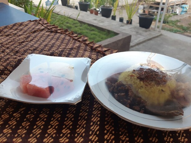 Imagen del bar/restaurante del Hotel Bis Homestay. Foto 21