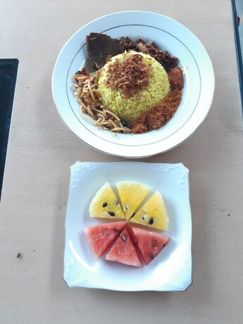 Imagen del bar/restaurante del Hotel Bis Homestay. Foto 23