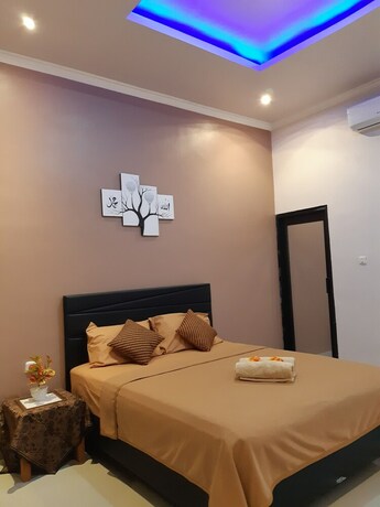 Imagen de la habitación del Hotel Bis Homestay. Foto 24