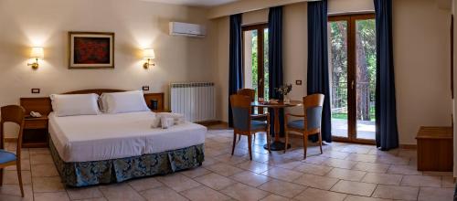 Imagen de la habitación del Hotel Bisanzio Resort. Foto 11