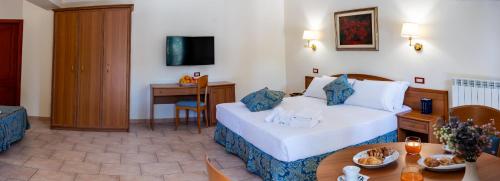 Imagen de la habitación del Hotel Bisanzio Resort. Foto 12