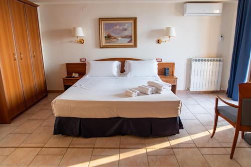 Imagen de la habitación del Hotel Bisanzio Resort. Foto 14