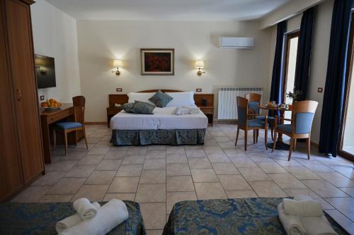 Imagen de la habitación del Hotel Bisanzio Resort. Foto 17