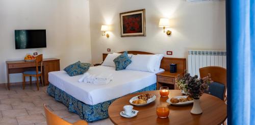 Imagen de la habitación del Hotel Bisanzio Resort. Foto 19