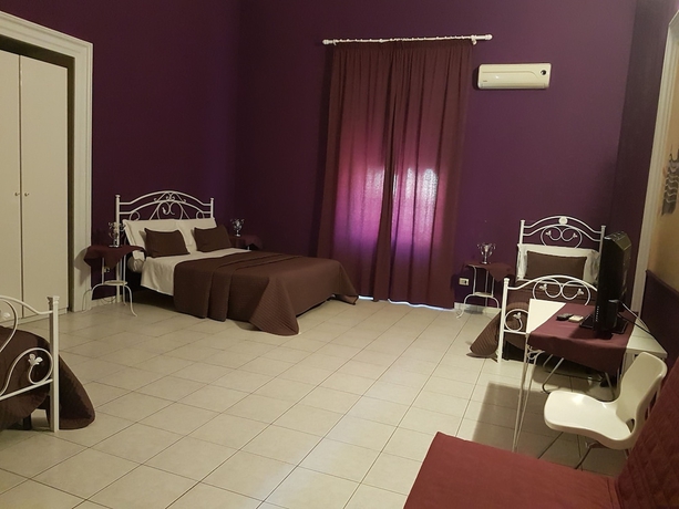 Imagen de la habitación del Hotel Biscari Catania. Foto 13