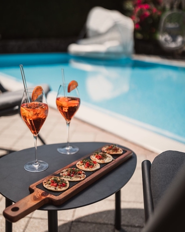 Imagen de la piscina del Hotel Bischofhof - Bistro Jasmin. Foto 19