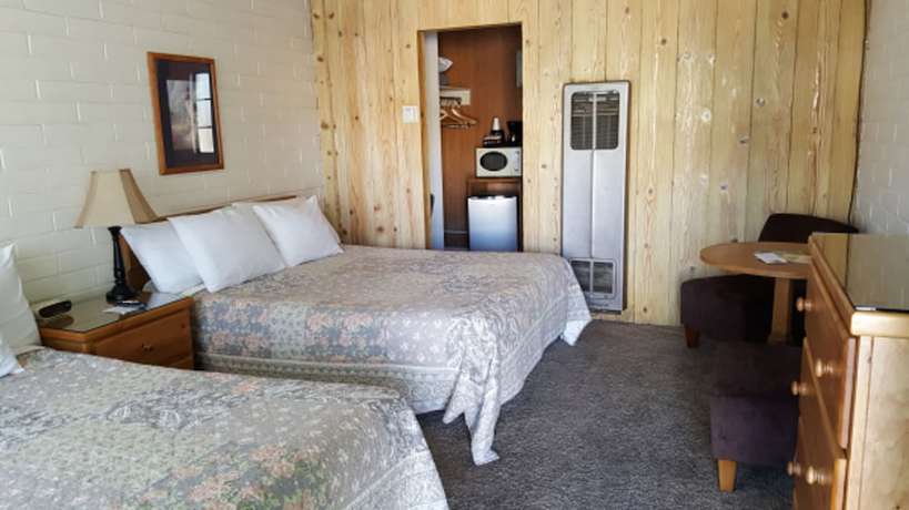 Imagen de la habitación del Hotel Bishop Village Motel. Foto 5