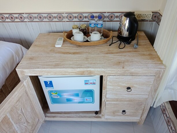 Imagen de la habitación del Hotel Bisma Jaya Bungalow. Foto 18