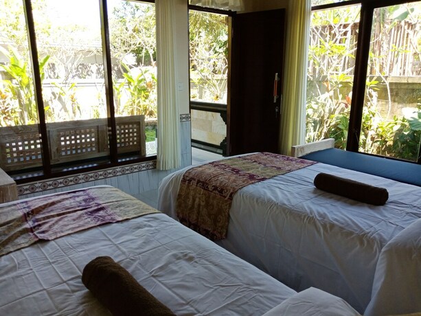 Imagen de la habitación del Hotel Bisma Jaya Bungalow. Foto 23