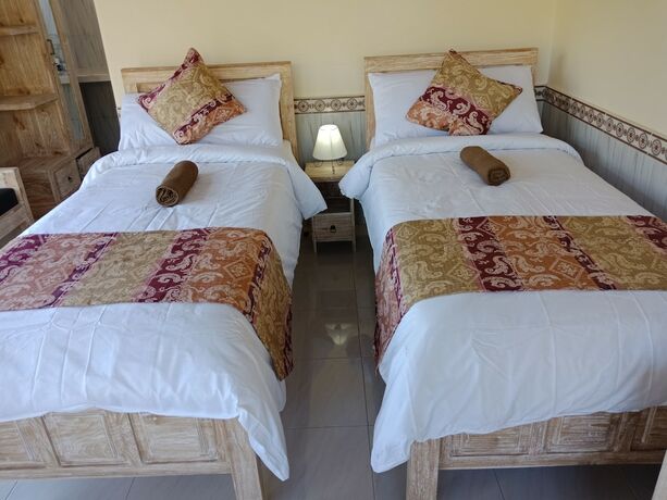 Imagen de la habitación del Hotel Bisma Jaya Bungalow. Foto 25