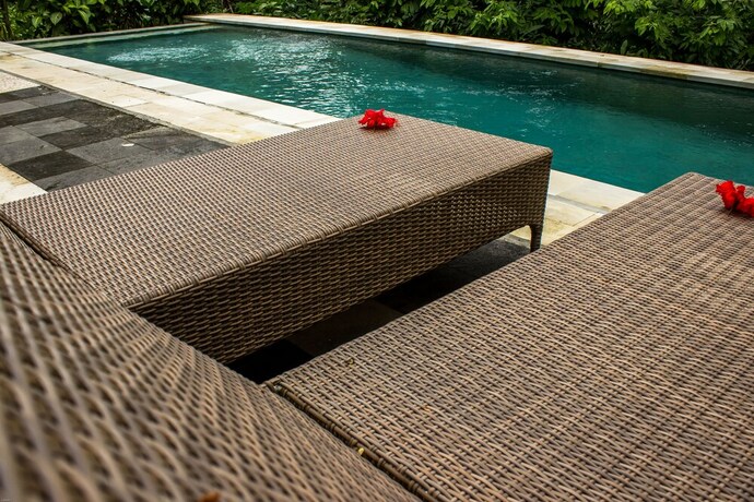 Imagen de la piscina del Hotel Bisma Jaya Bungalow. Foto 28