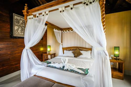Imagen de la habitación del Hotel Bisma Sari Resort Ubud. Foto 2