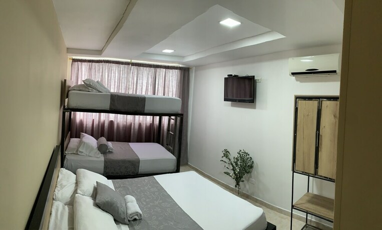 Imagen de la habitación del Hotel Bisou. Foto 15
