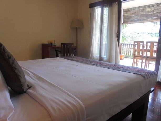 Imagen de la habitación del Hotel Biyukukung Suites and Spa. Foto 3