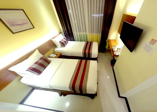 Imagen de la habitación del Hotel Biz Boulevard. Foto 17