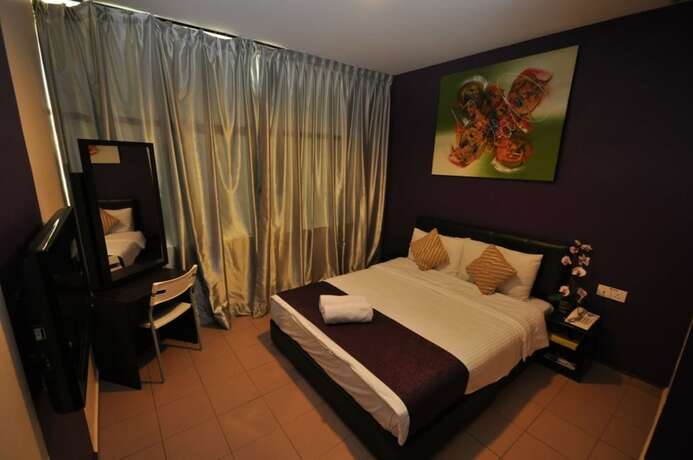 Imagen de la habitación del Hotel Biz. Foto 9