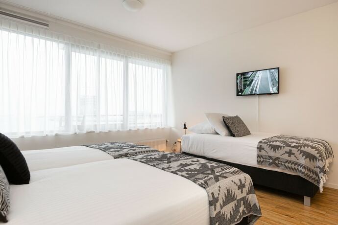 Imagen de la habitación del Hotel BizStay Harbour Scheveningen Apartments. Foto 11