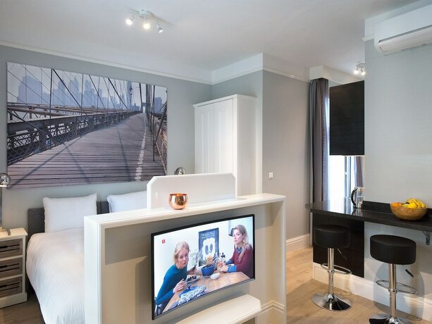 Imagen de la habitación del Hotel BizStay Park Central Apartments. Foto 11