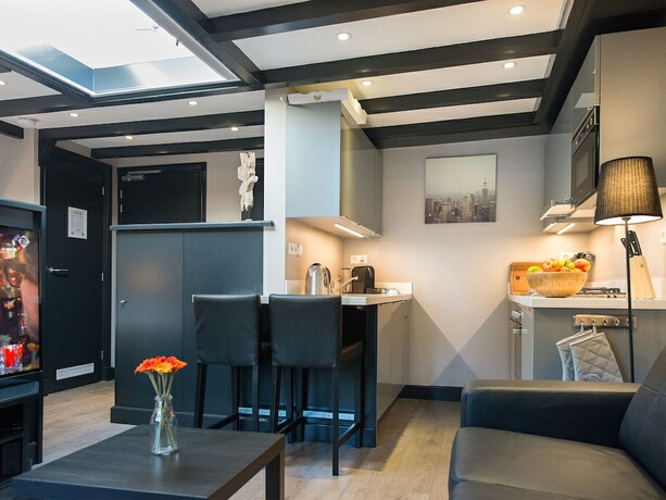 Imagen de la habitación del Hotel BizStay Park Central Apartments. Foto 12