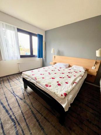 Imagen de la habitación del Hotel Bizzhotel. Foto 19