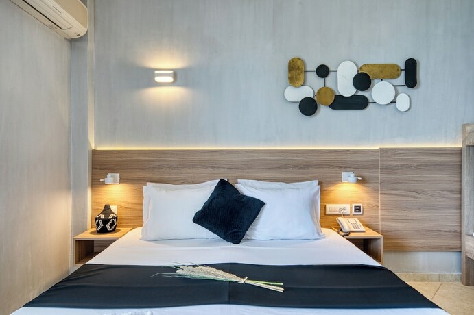 Imagen de la habitación del Hotel Black And White Boho Resort. Foto 13