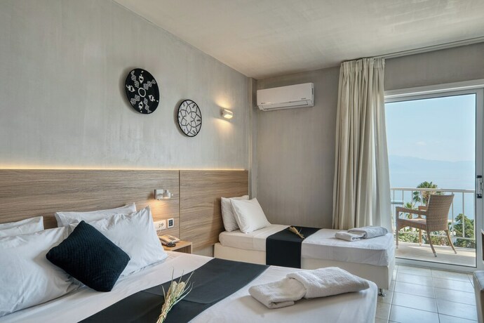 Imagen de la habitación del Hotel Black And White Boho Resort. Foto 19
