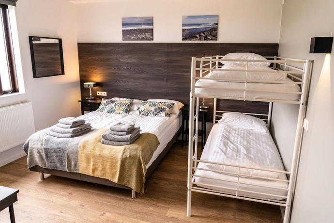 Imagen de la habitación del Hotel Black Beach Guesthouse. Foto 6