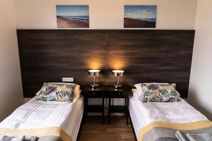 Imagen de la habitación del Hotel Black Beach Guesthouse. Foto 9